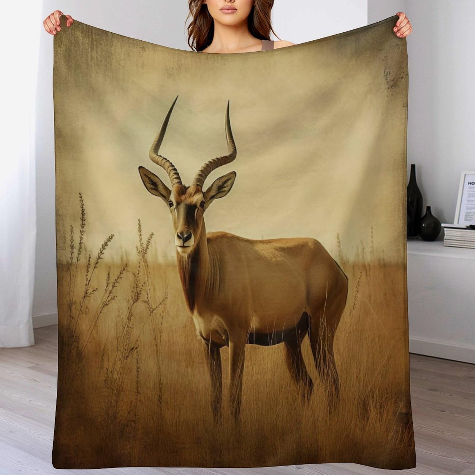 Manta de franela para sofá cama Antílope ideal para tardes de cine y lectura en el hogar