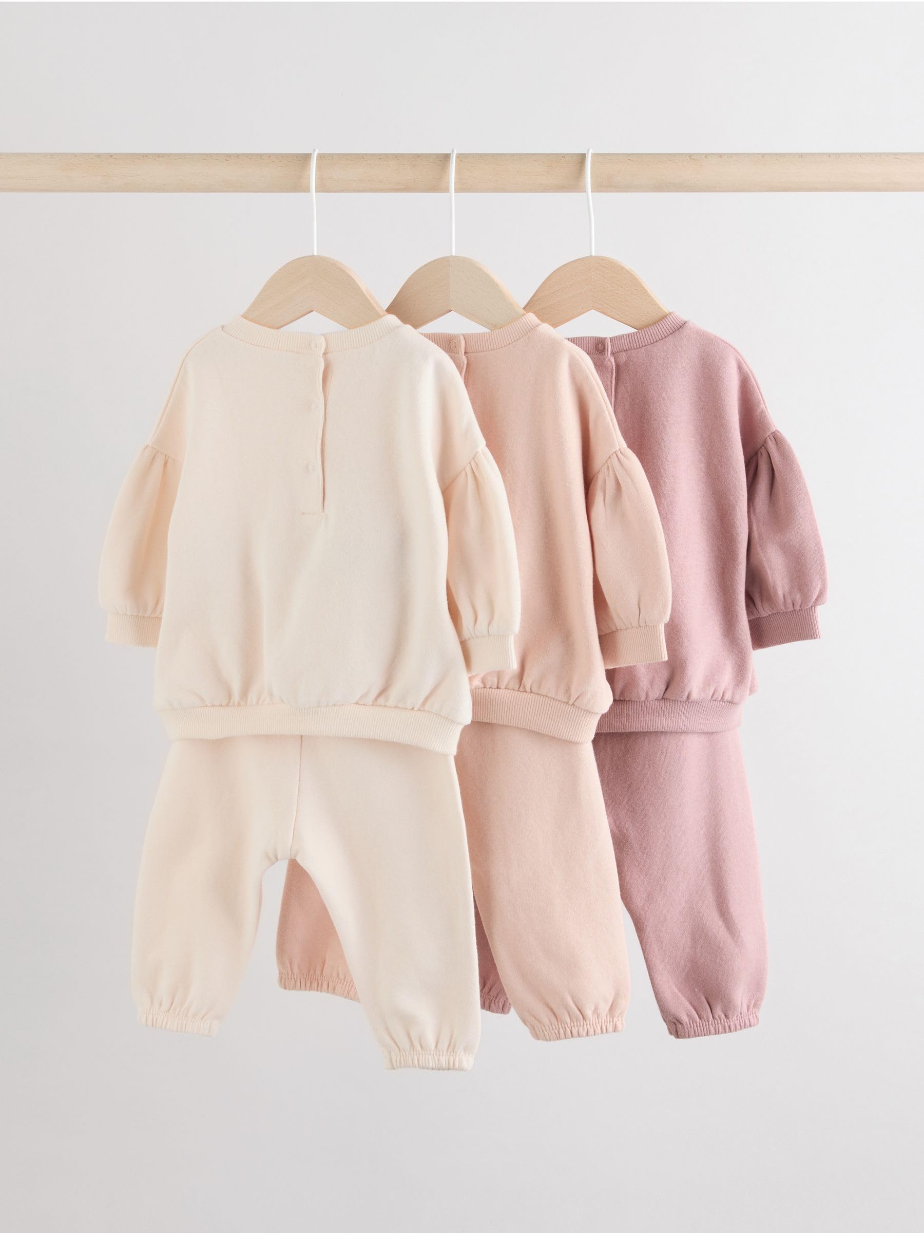 NEXT Bebés niña Conjunto de 6 prendas con sudaderas y pantalones de chándal para bebé