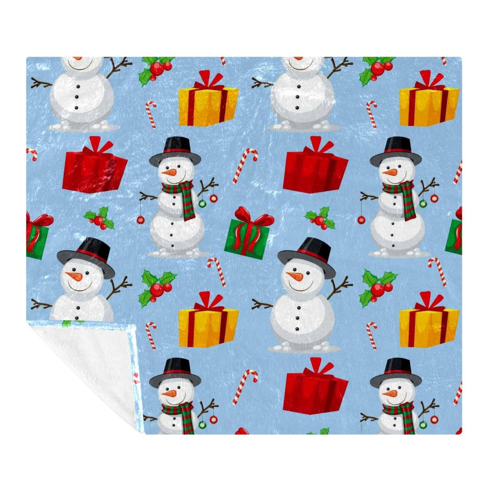 Couverture bonhomme de neige pour cocooning sur le canapé du salon
