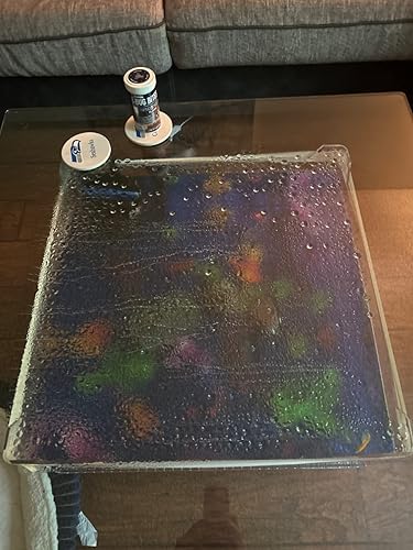 Review Image by Base should have come with dowls to keep glass from sliding around and keep it even. Glass fogs up and you can’t see anything. Fish jump out of open sides.