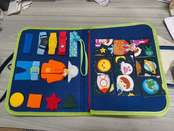 Customer photo of toddler using the busy board at home