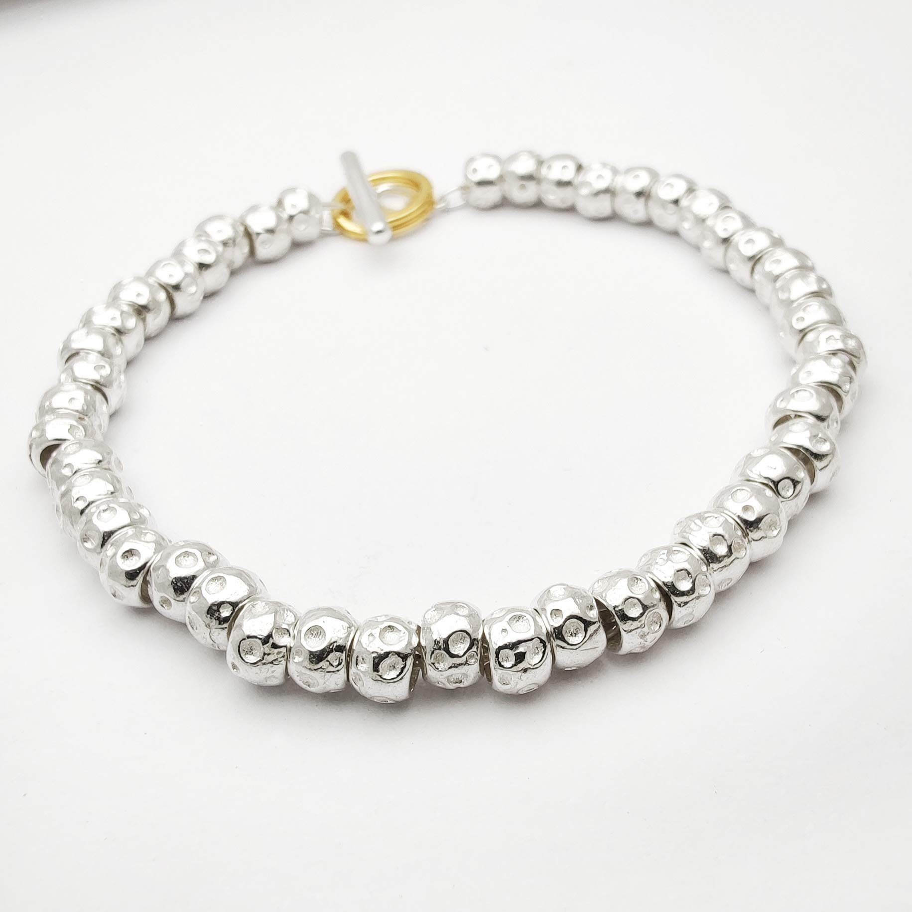 Bracciale uomo donna unisex,in ARGENTO 925 con granelli pepite martellate, realizzato su misura, completo di scatola regalo e panno per pulizia gioielli