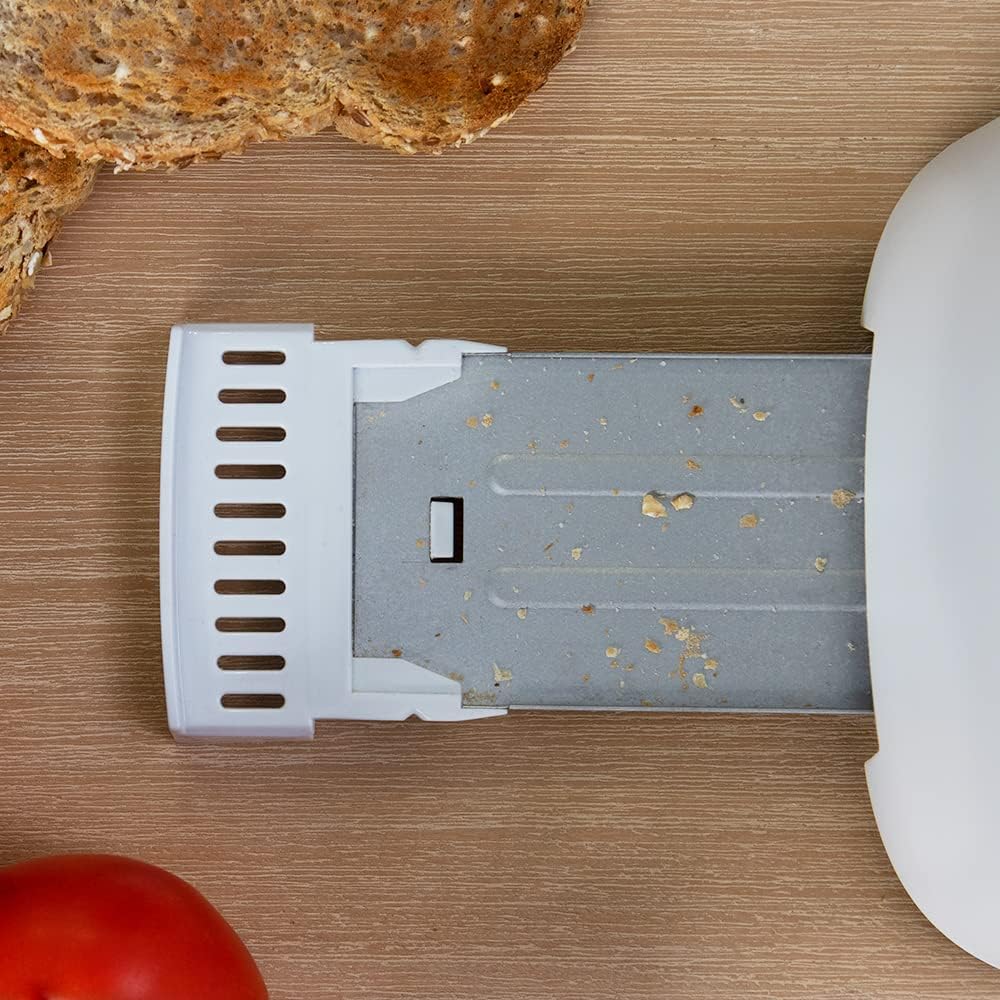 Crumb tray pulled out from toaster