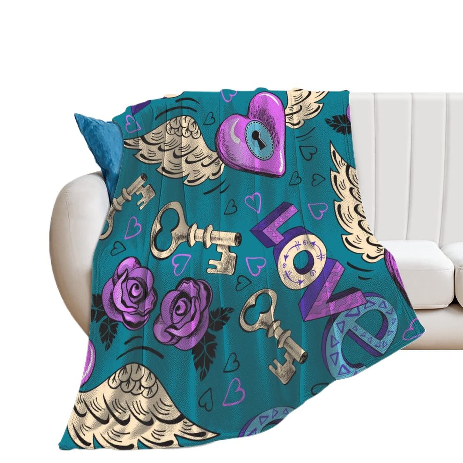 Couverture polaire ailes d'amour pour vos soirées cocooning sur le canapé 130x150cm