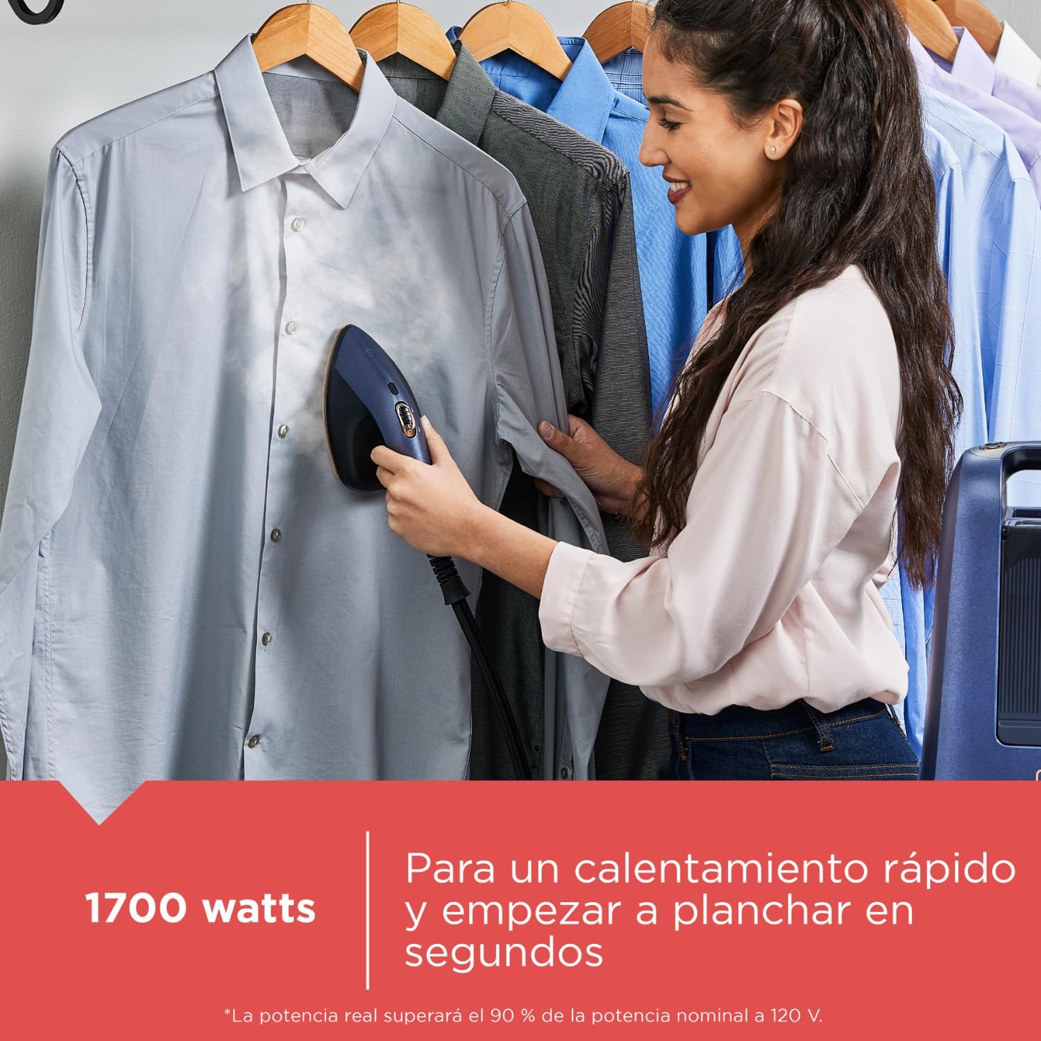 Person steaming a shirt with the BLACK+DECKER HGS600-LA steamer
