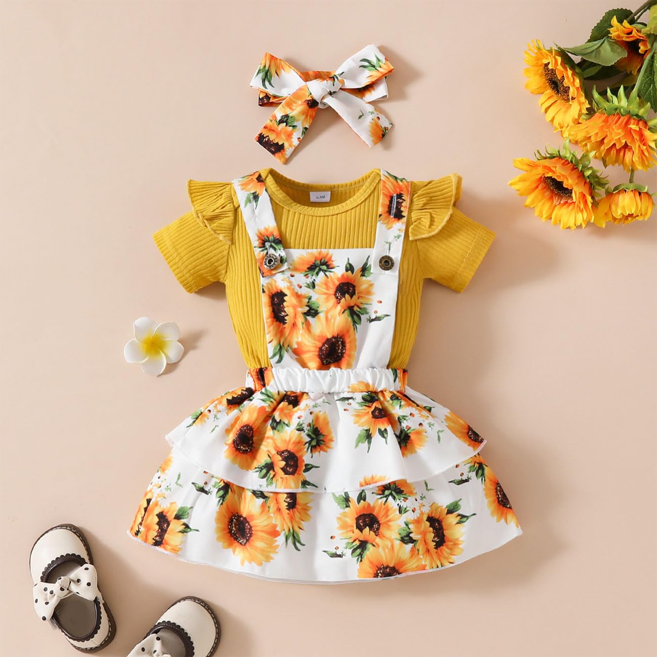 Ensemble de Vêtements Bébé Fille, Combinaison Manches Courtes Volants et Boutons Pression à l'entrejambe, Tournesol Extensible Bretelles Button Jupe Nœud Papillon Bandeau Tenue, 0-18 Mois