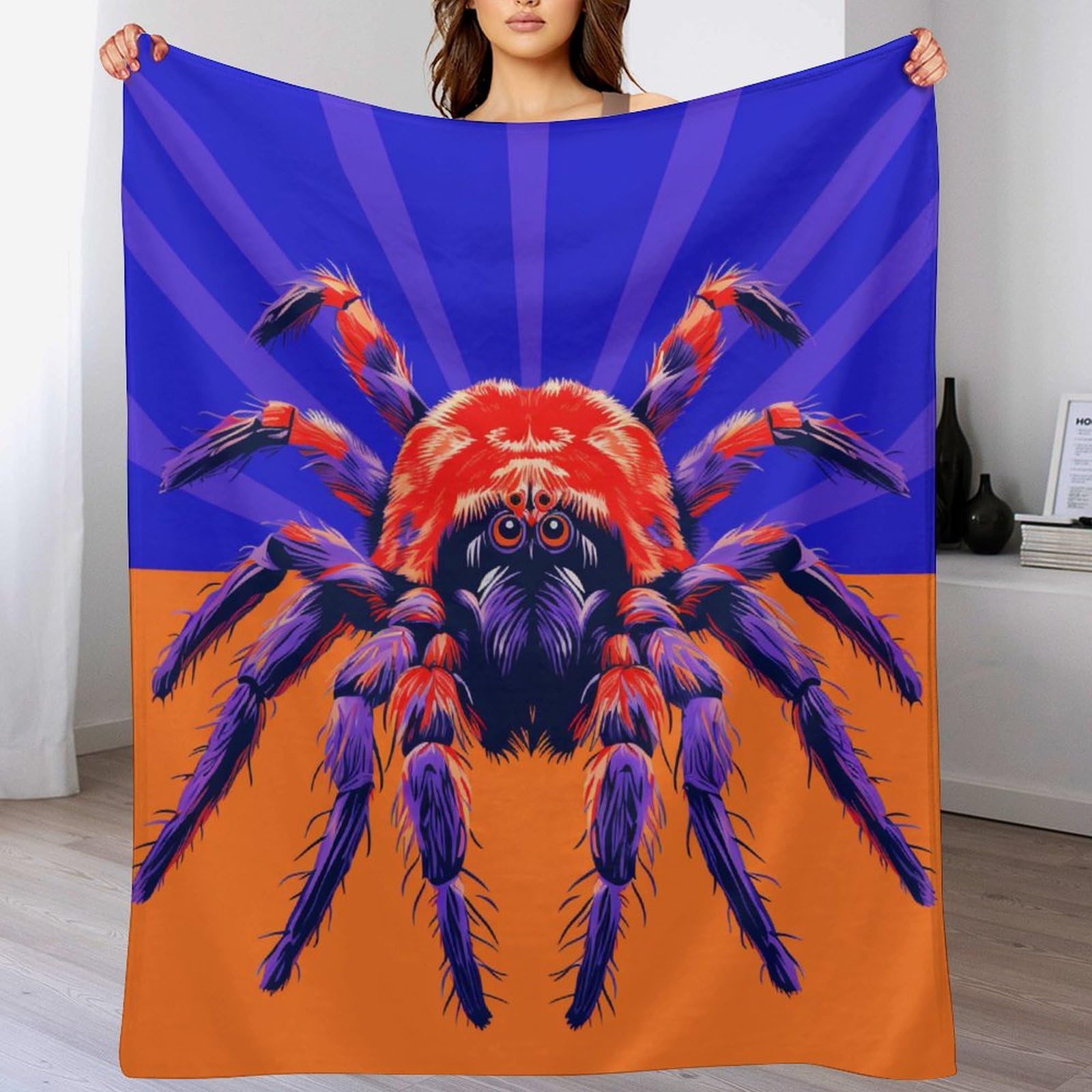 Plaid motif araignée idéal pour les nuits fraîches et moments cocooning sur le canapé du salon