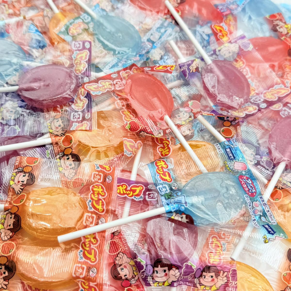 不二家　POP CANDY　ペコちゃん　１０円飴 キャンディーケース Amazon.co.jp: 不二家 ポップキャンディ 60本 詰め合わせ 大容量 棒