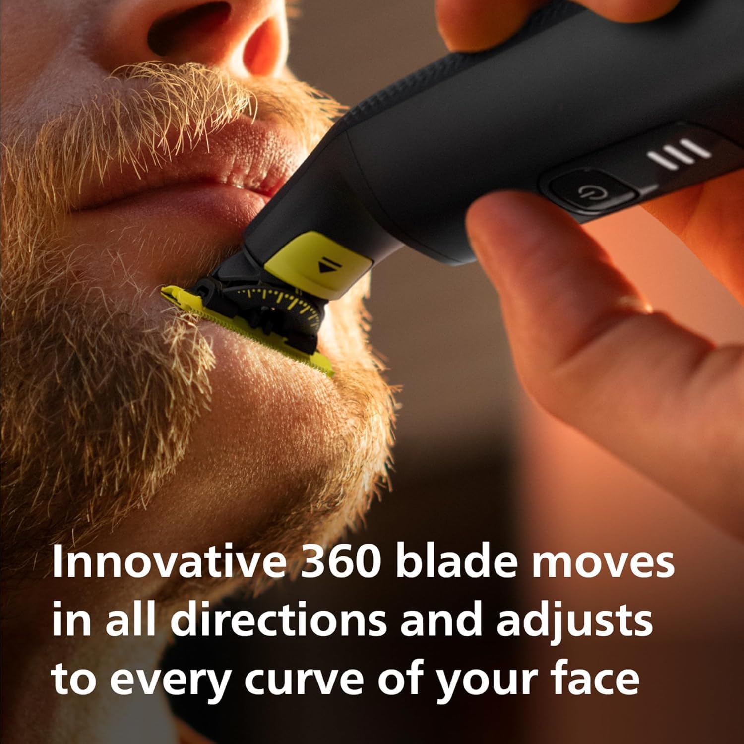 A person using the Philips OneBlade 360 Pro for body grooming with the body comb and skin guard.
