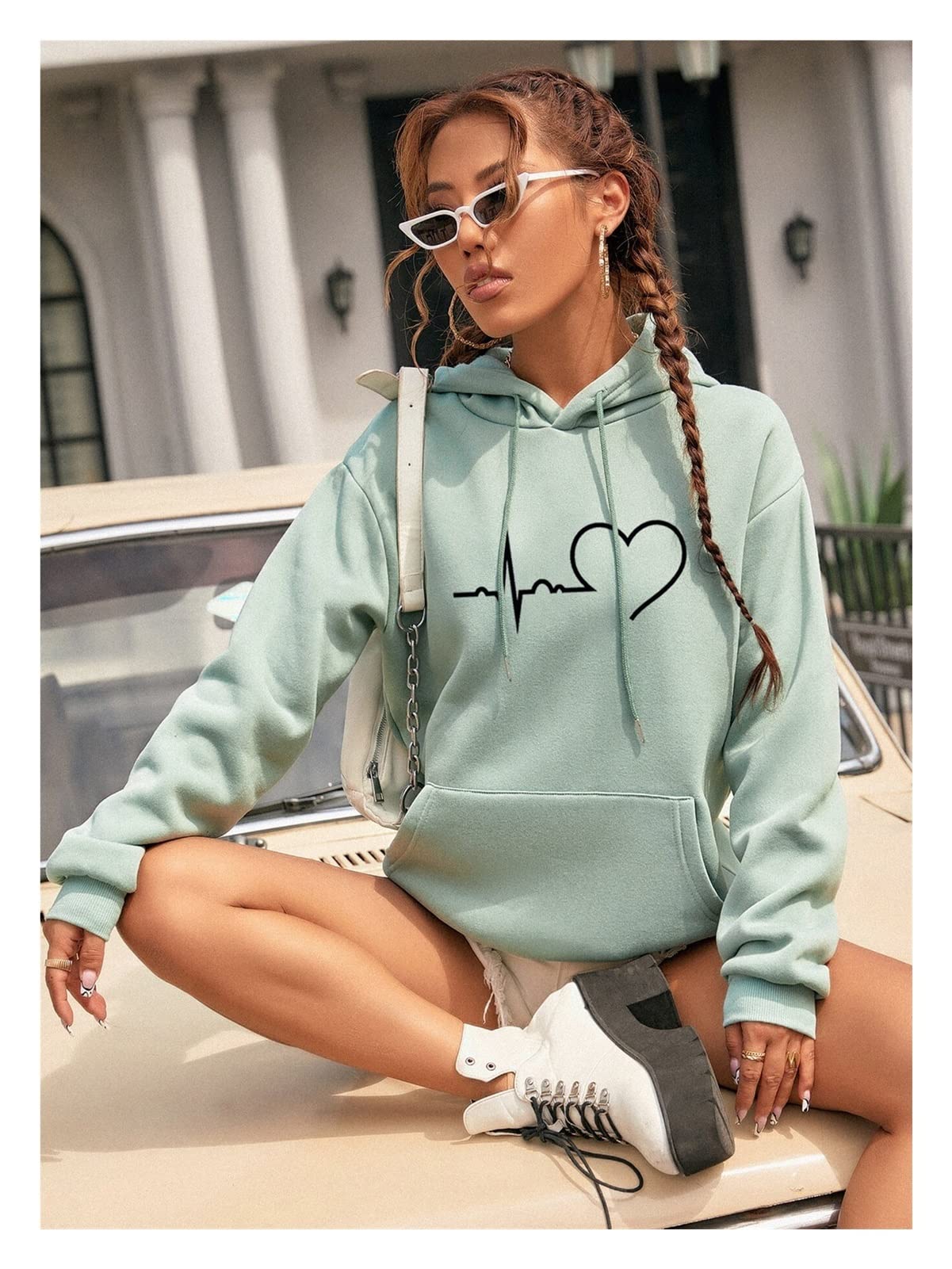 Sweat à capuche ample femme pull long confortable qui camoufle les formes avec style