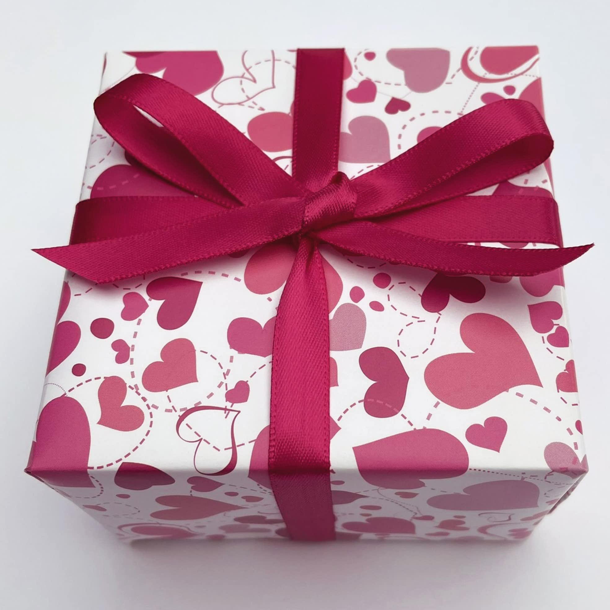 Anniversary/Wedding Wrapping Paper. Gift Wrap with Ribbon. 4 XL Sheets (50 x 70cm). Pink Hearts. Ideal for Anniversary, Wedding, Birthday, Valentines, Wife or Girlfriend. With 3 metres of Pink Ribbon.The Forest Stewardship Council