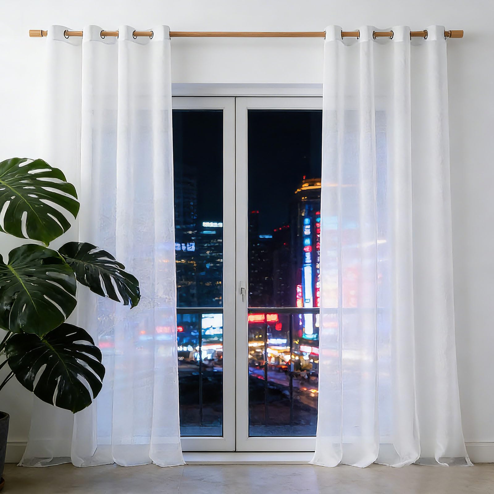 Rideaux voilages blanc à œillets protection anti-UV maison