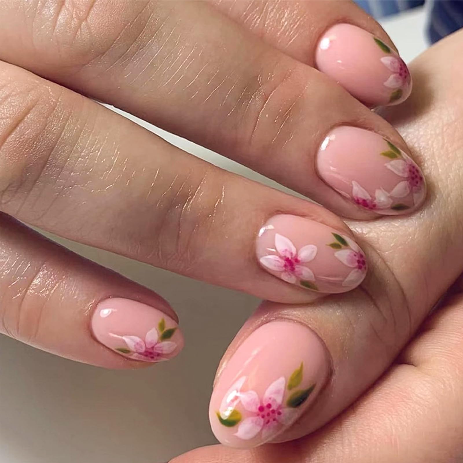 YOSOMMK Short Fake Nails Almond Shaped Press on Nails with Flower Designs Nude Pink Glue on False Nail Cute Glossy Stick on Acrylic Nail for Women and
