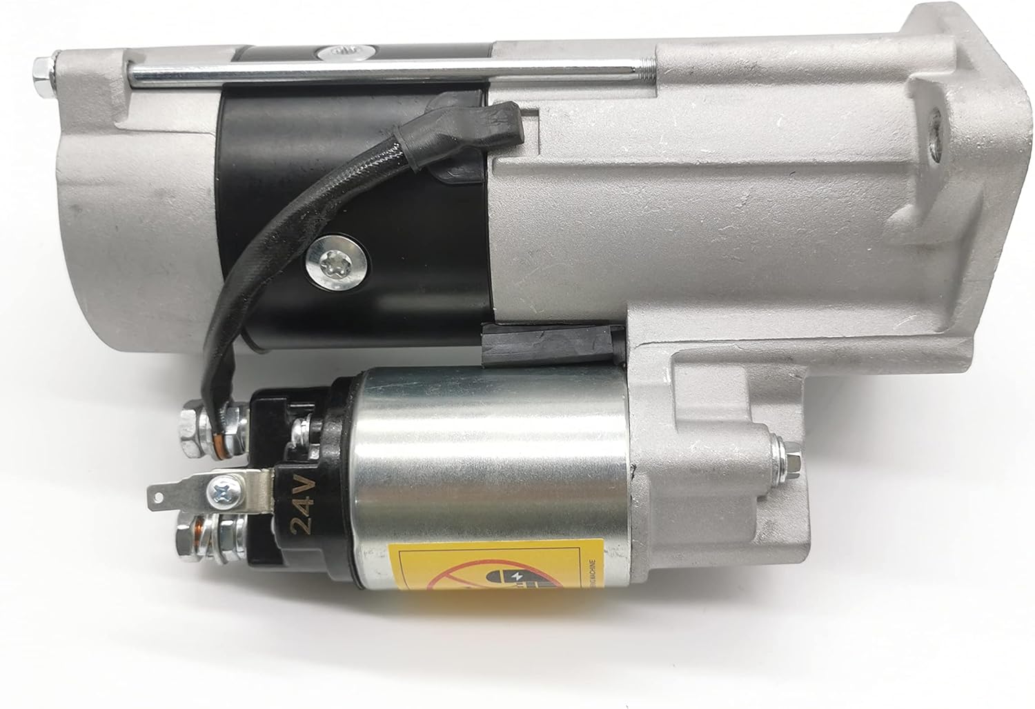 Close-up of the starter motor's electrical connections