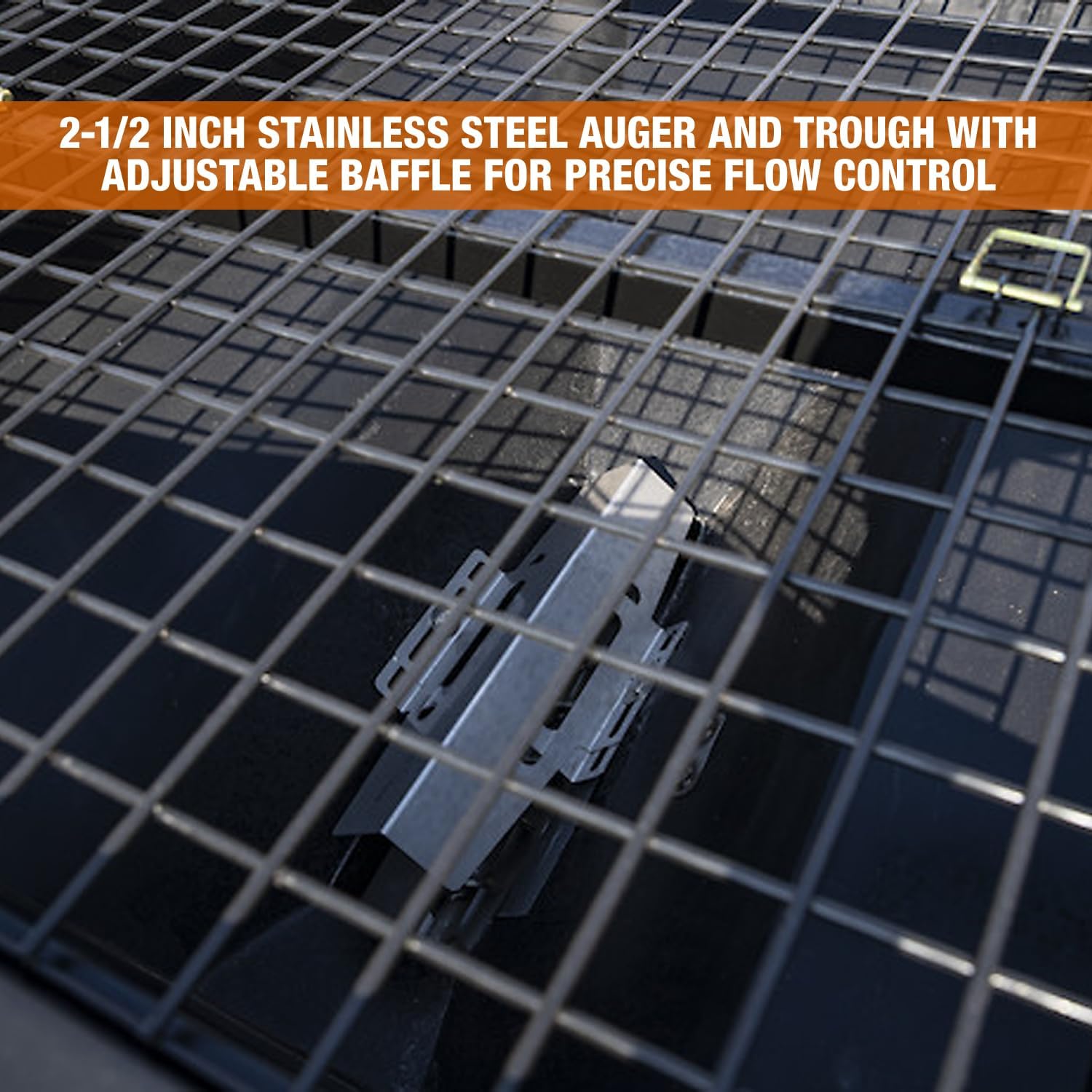 Close-up view of the 2-1/2 inch stainless steel auger and trough inside the hopper.