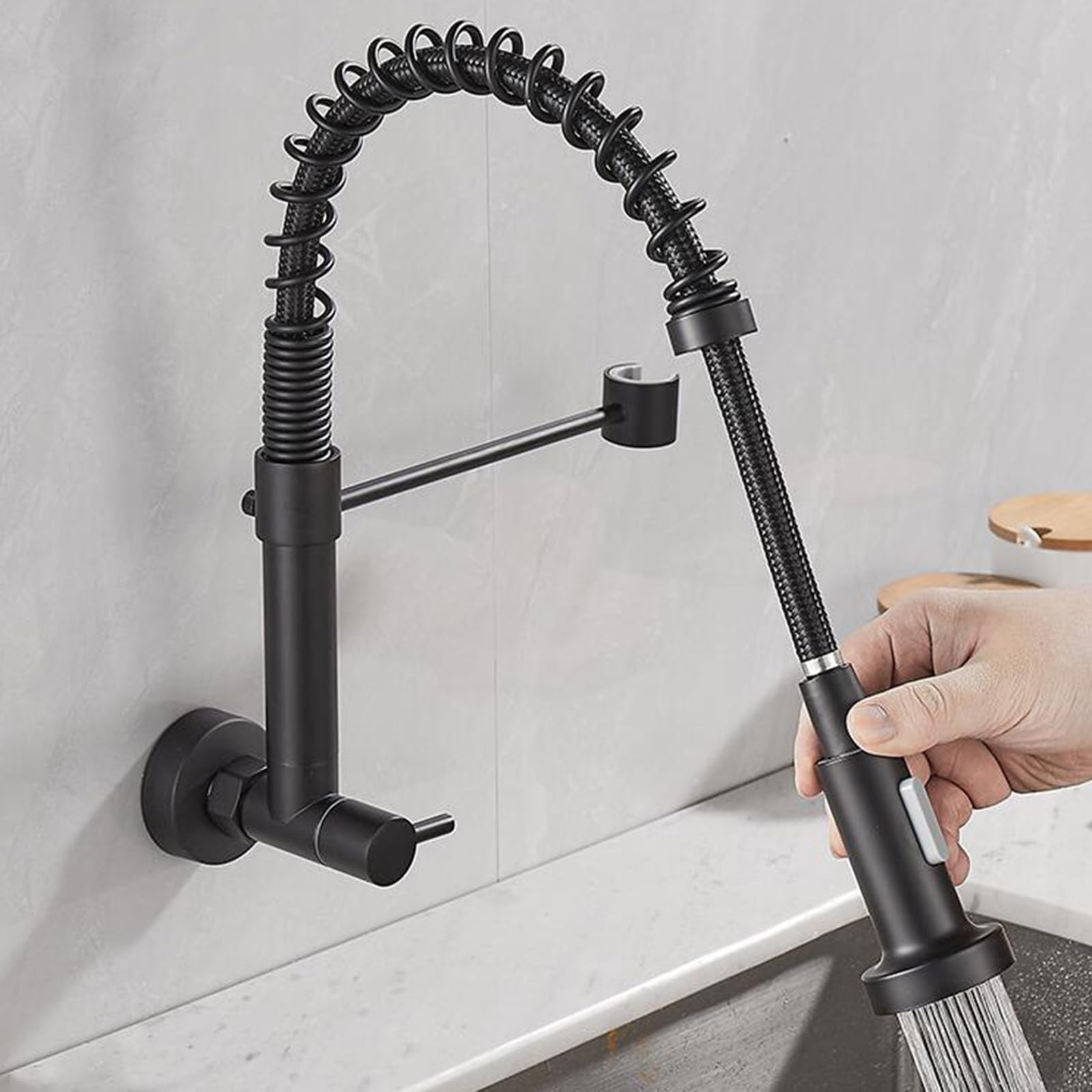 Grifo de cocina solo agua fría de pared en latón con caño flexible negro