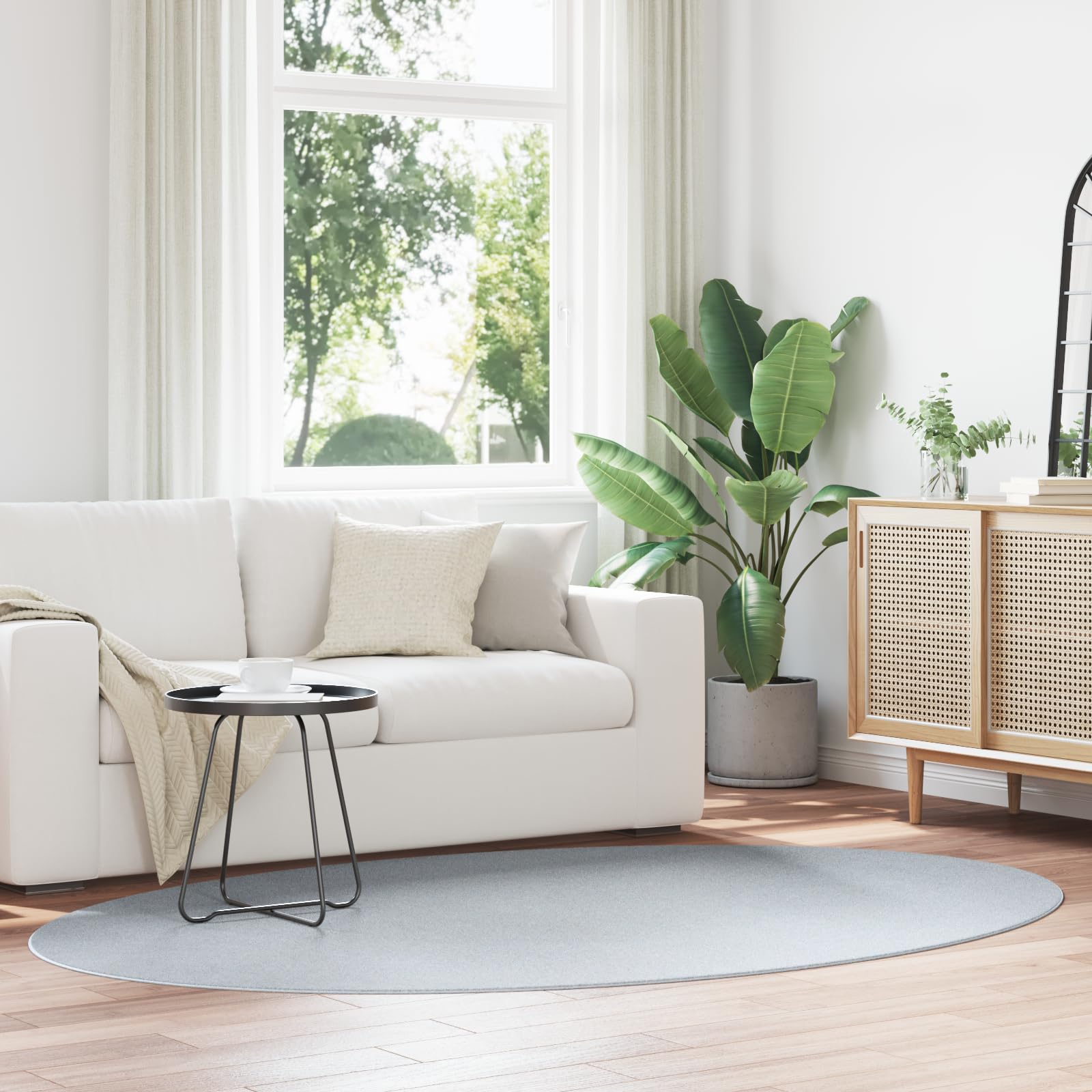 Tapis ovale gris Huarte pour chambre à coucher et salon au design élégant