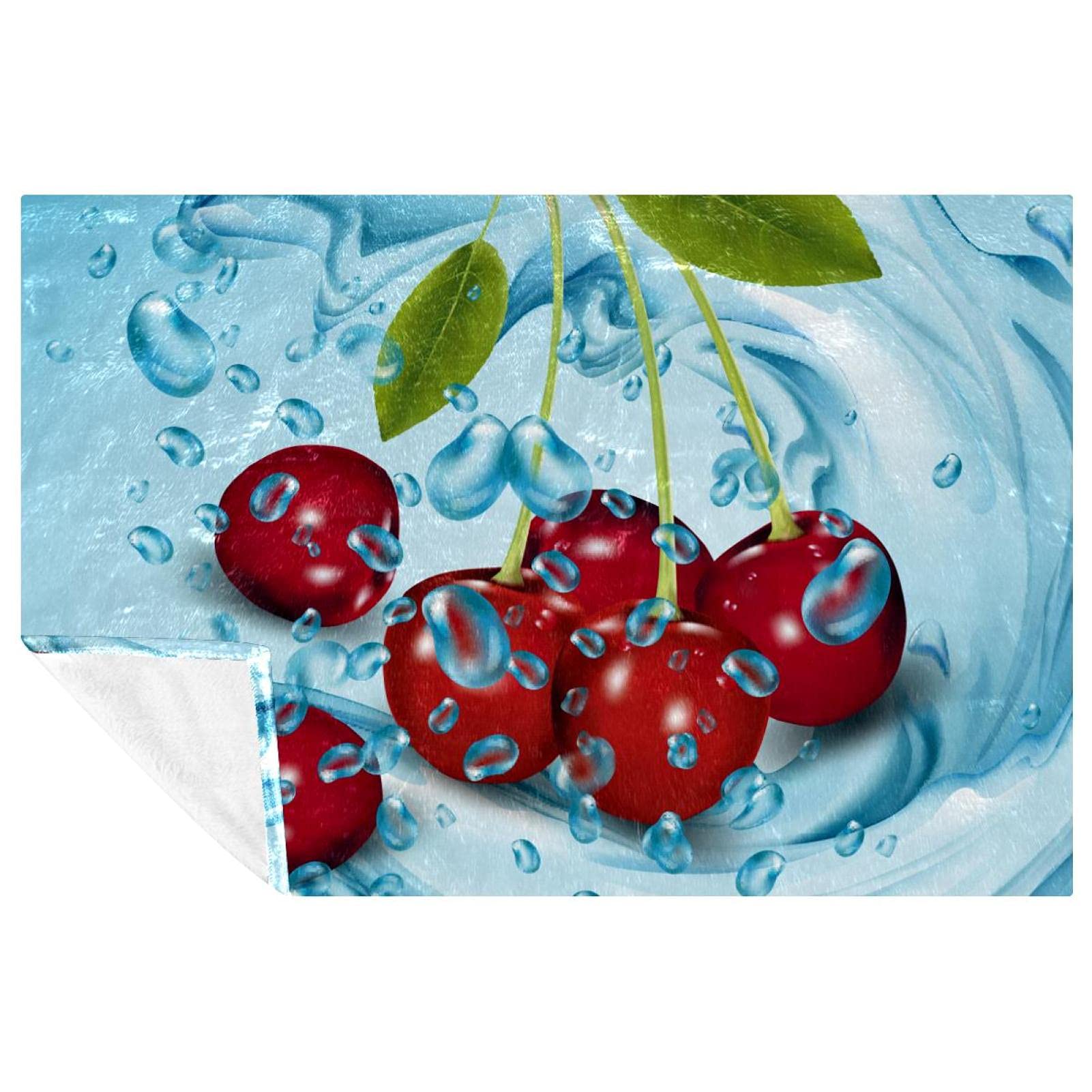 Couverture douce motif cerise pour des moments complices et cocooning
