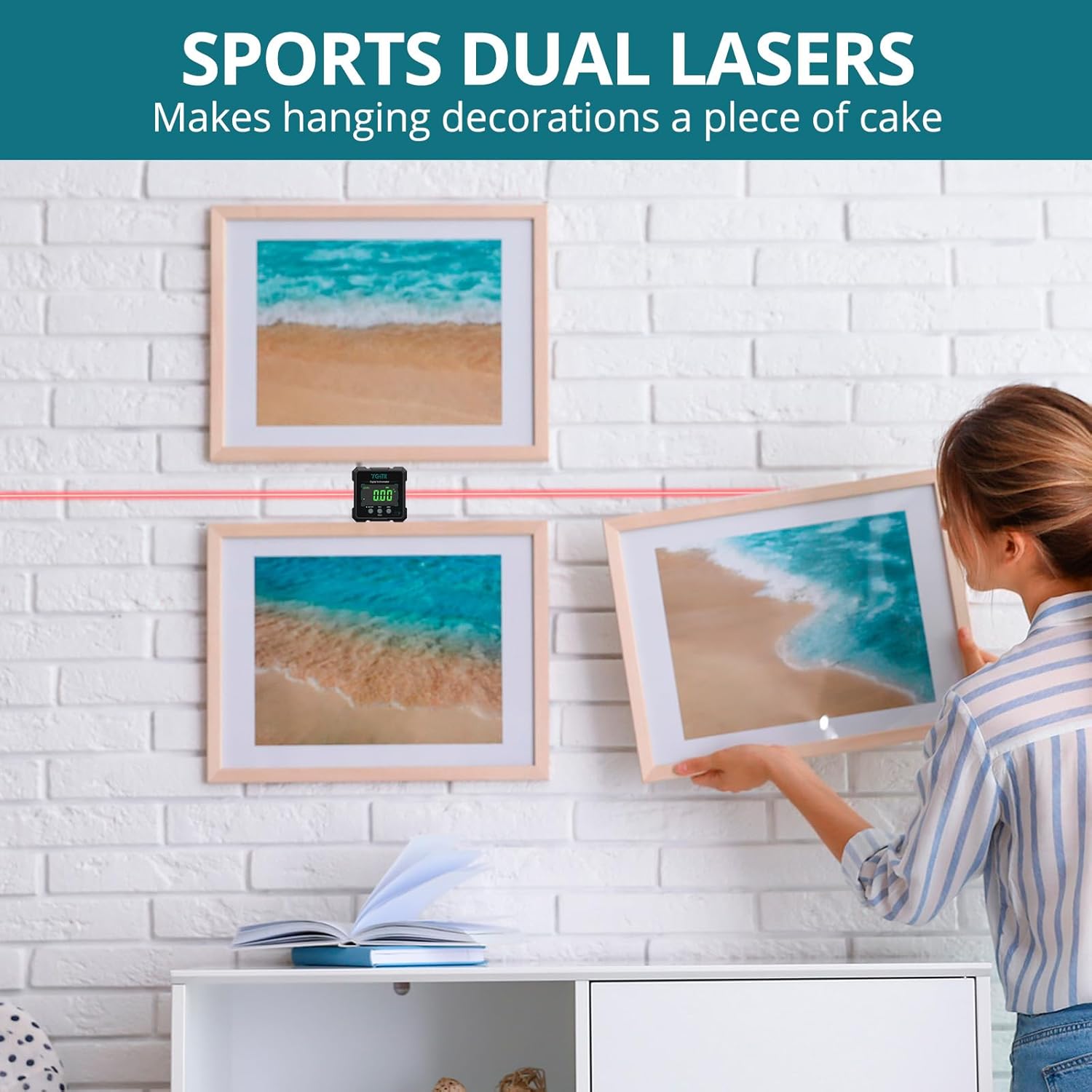 YGiTK Digital Inclinometer KTY006 projecting dual laser lines to align picture frames on a wall