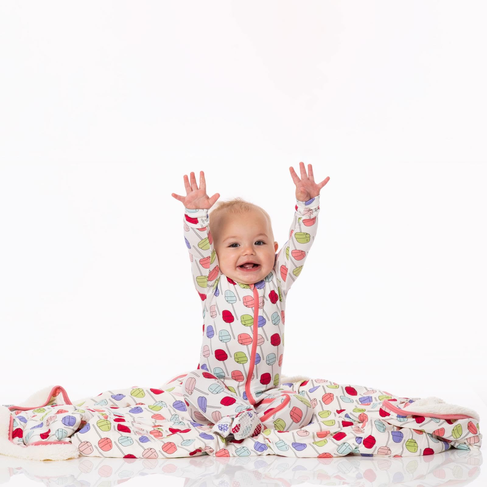 KicKee Print Footie with Zipper, Fitted Long Sleeve Pajamas, Ultra Soft Everyday One-Piece Loungewear, 90s (Lula's Lollipops - 3-6 Months)