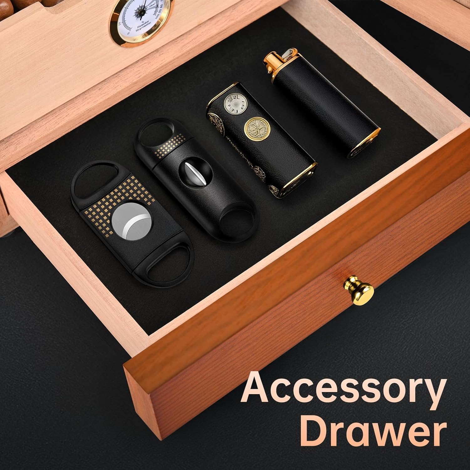 Close-up of the accessory drawer with cigar cutters and lighters.