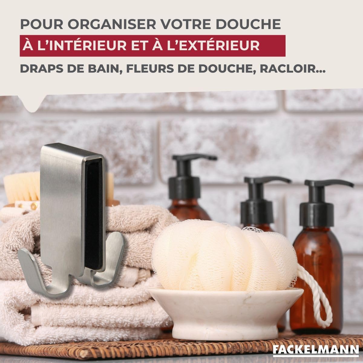Fackelmann Double Hook in use, holding a loofah and towels