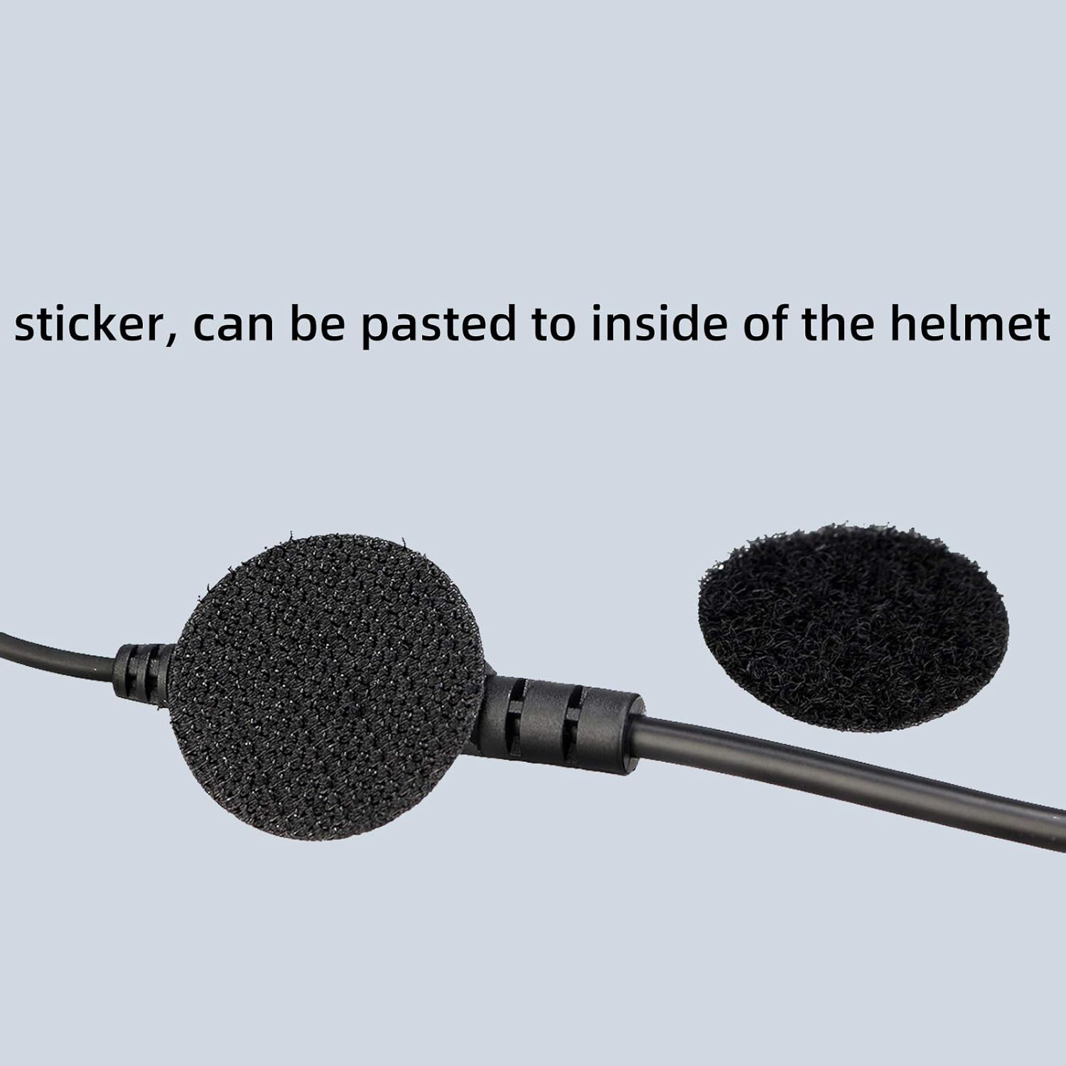 Microphone with adhesive backing for helmet installation