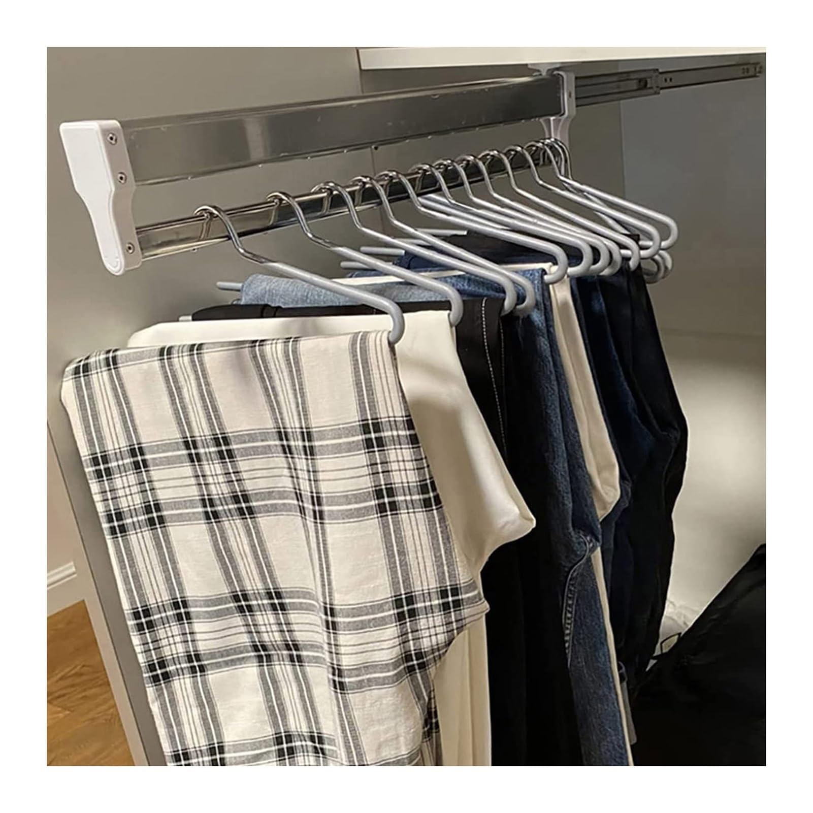 Tringle à vêtements réglable gain de place pour suspendre 25kg en petit espace