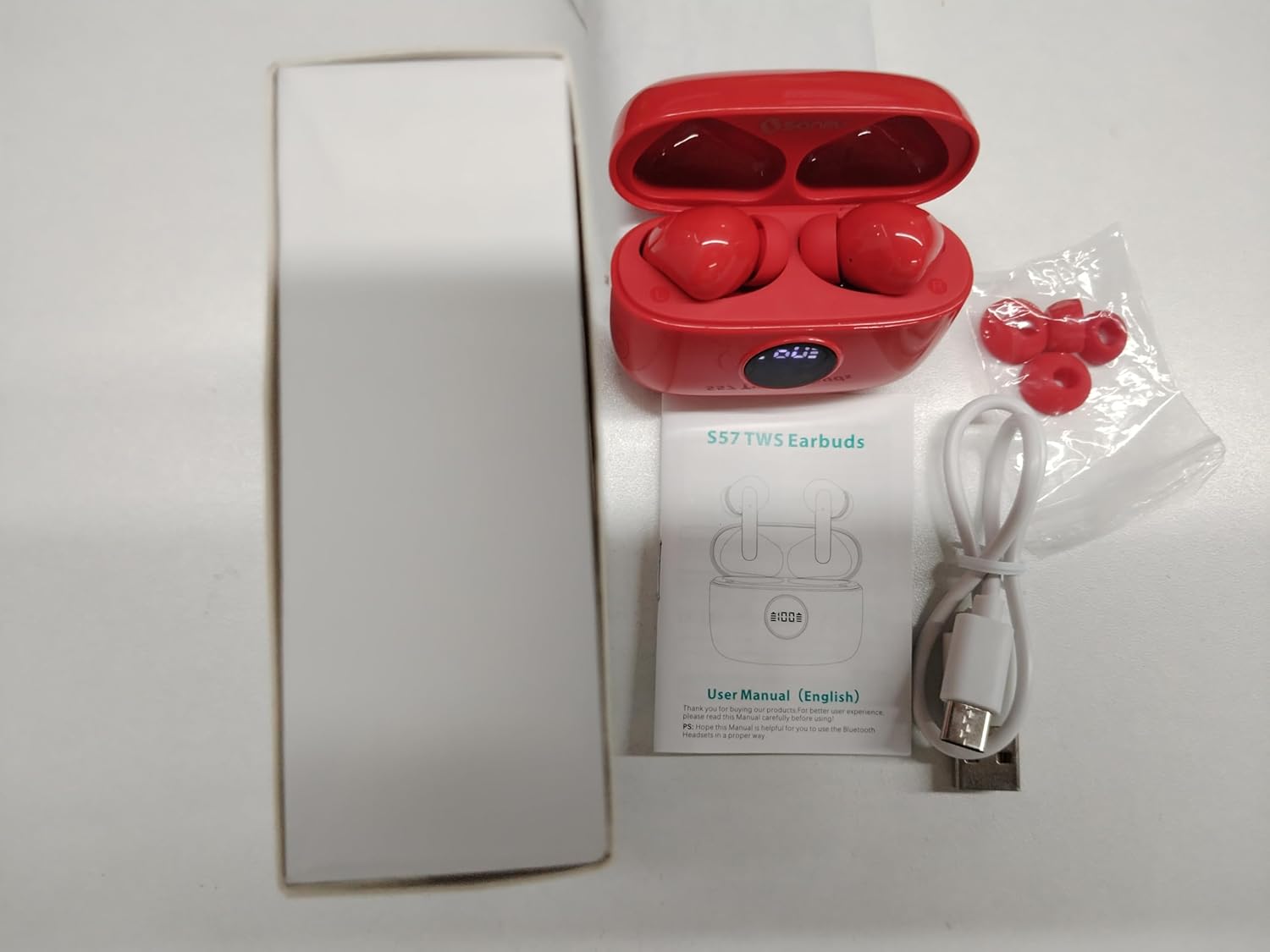 Image showing a smartphone screen with Bluetooth settings, indicating successful connection to 'S57' earbuds, demonstrating one-step auto pairing.