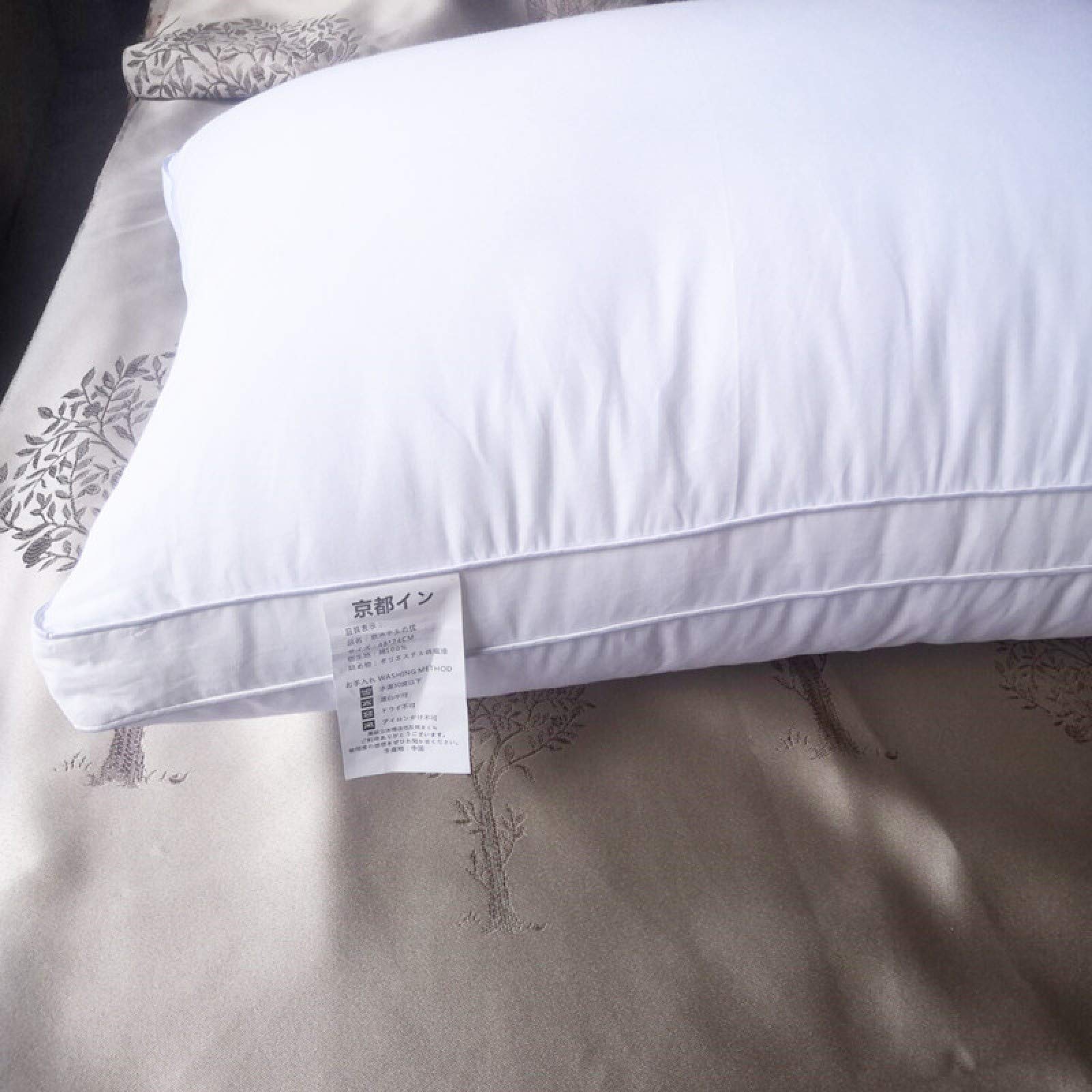 Oreiller cervical en coton contre le mal de dos et les tensions