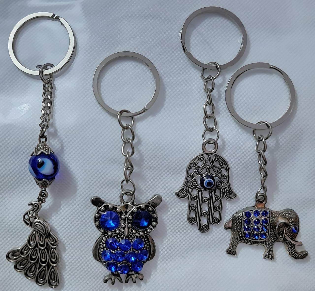 Buy Fashion Mahal feng Shui Key Chain Combo Hamsa, Elephant, Peacock