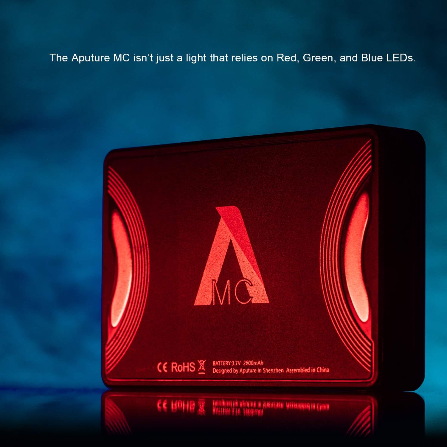 lateral view of the Aputure AL-MC light showing its small display screen with 'HUE 360' and battery icon, and control buttons.