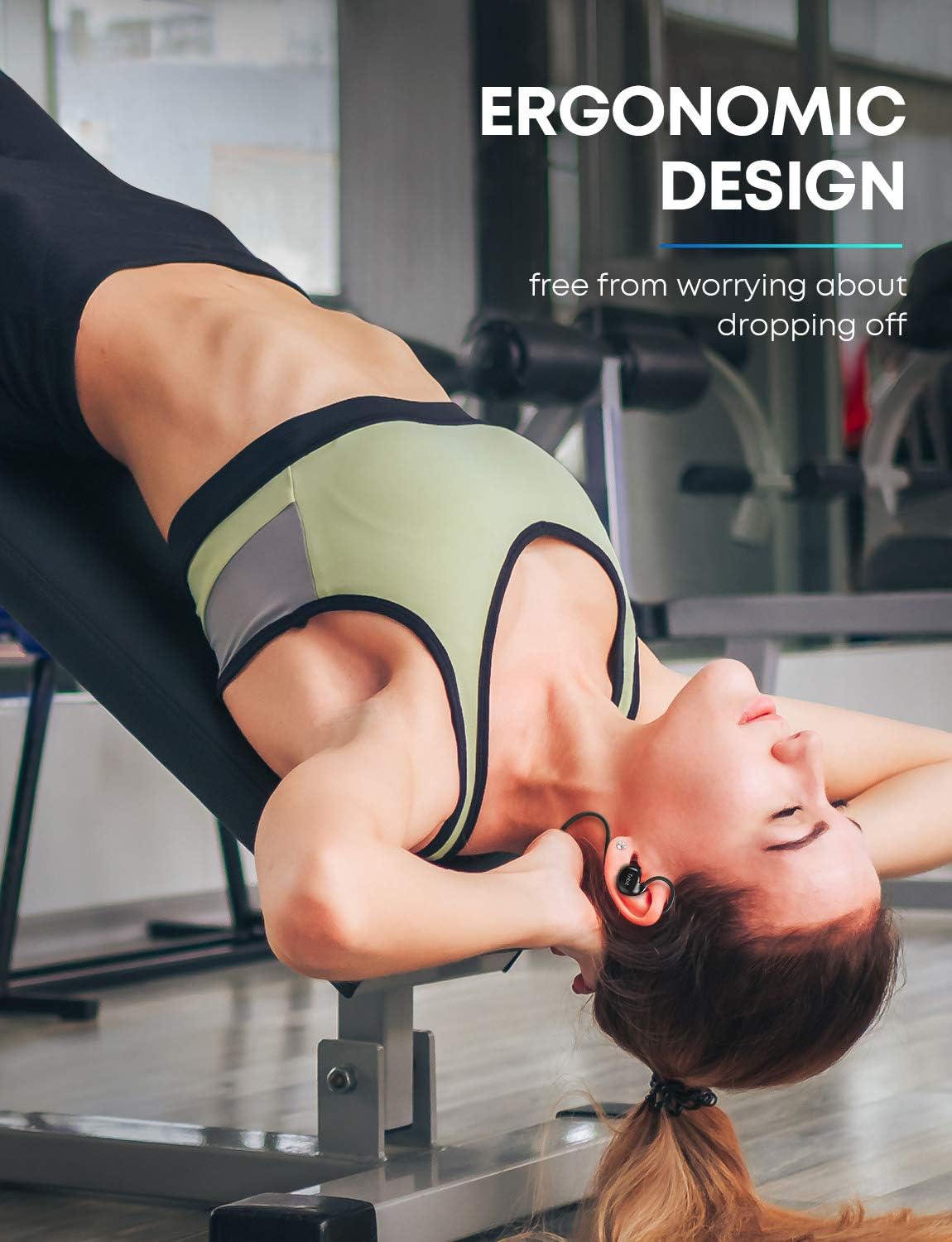 Woman exercising while wearing Tribit XSport Fly Earphones, showing ergonomic design