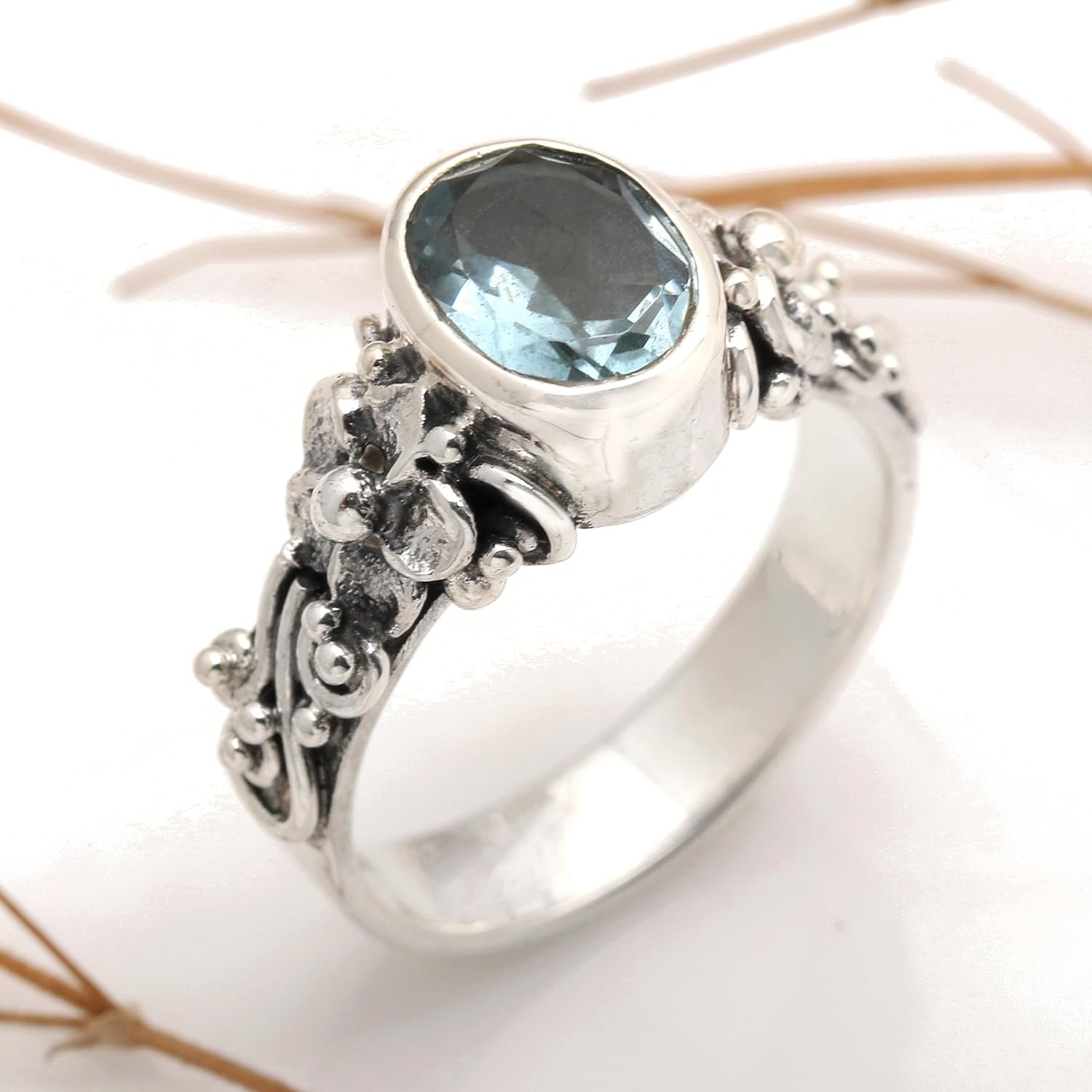 NOVICA Artisan Handmade Blue Topaz Single Stone Ring Oval Cut Silver with Floral Design Sterling Cocktail Indonesia Serenity Birthstone 'Frangipani Path' - Image 2