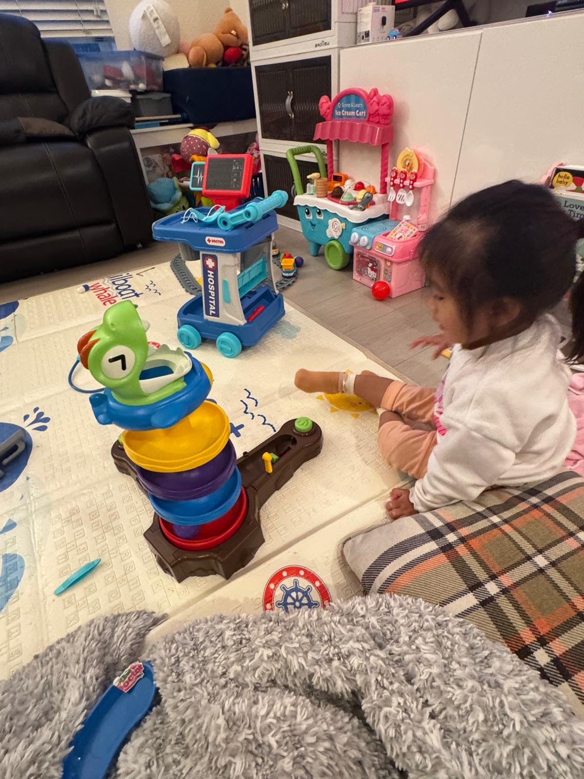 Customer Review Image - Child Playing with Dinosaur Ball Drop Toy