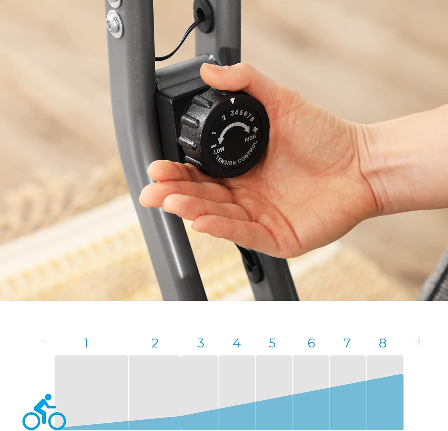 Close-up image of the resistance control knob on the SONGMICS exercise bike, showing levels 1 through 8.