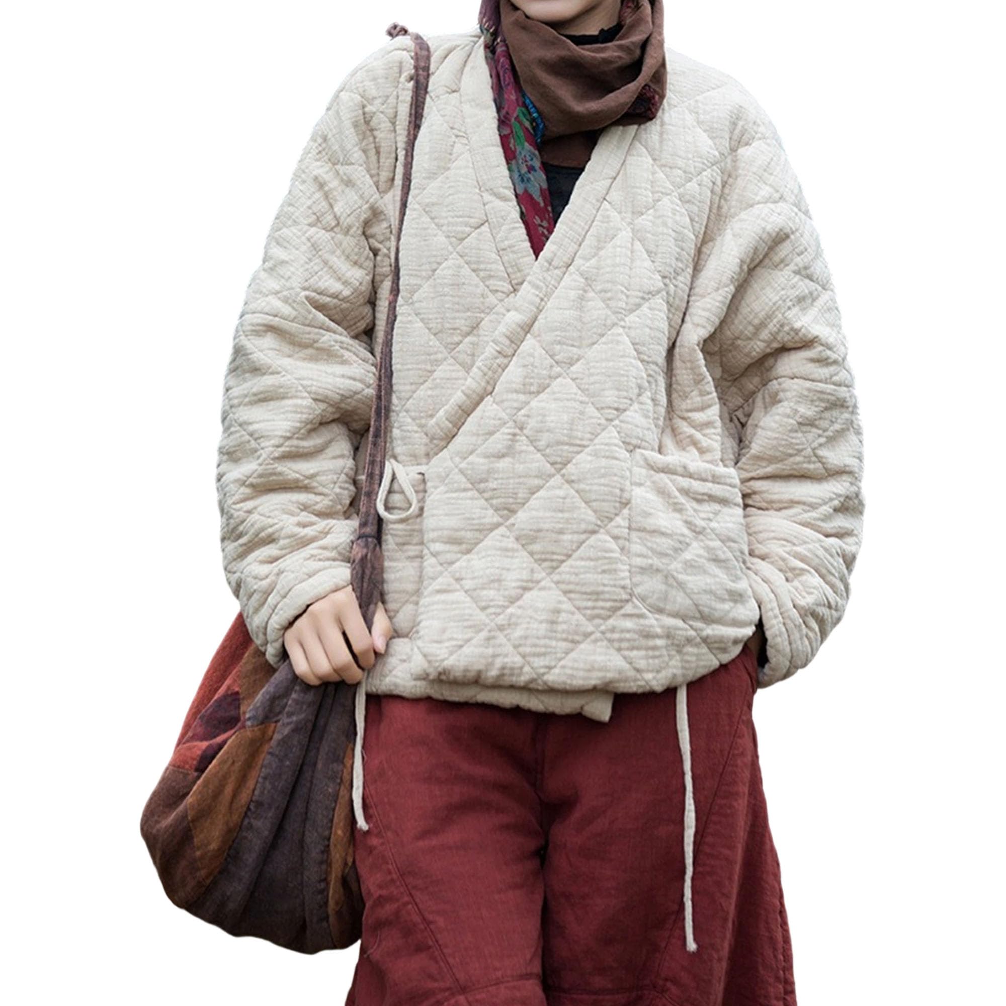 Cappotto invernale da donna trapuntato con laccetti in vita, leggero