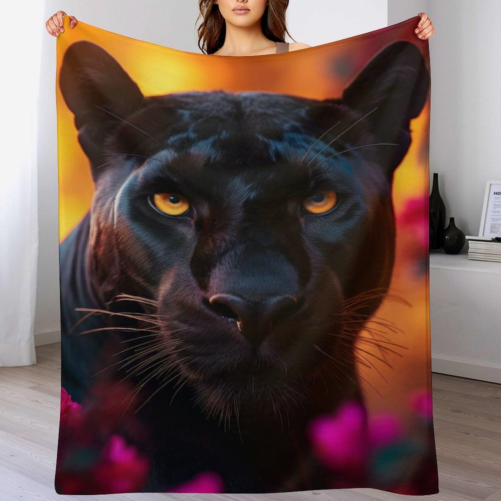 Couverture polaire panthère noire douce pour réchauffer vos soirées fraîches sur le sofa