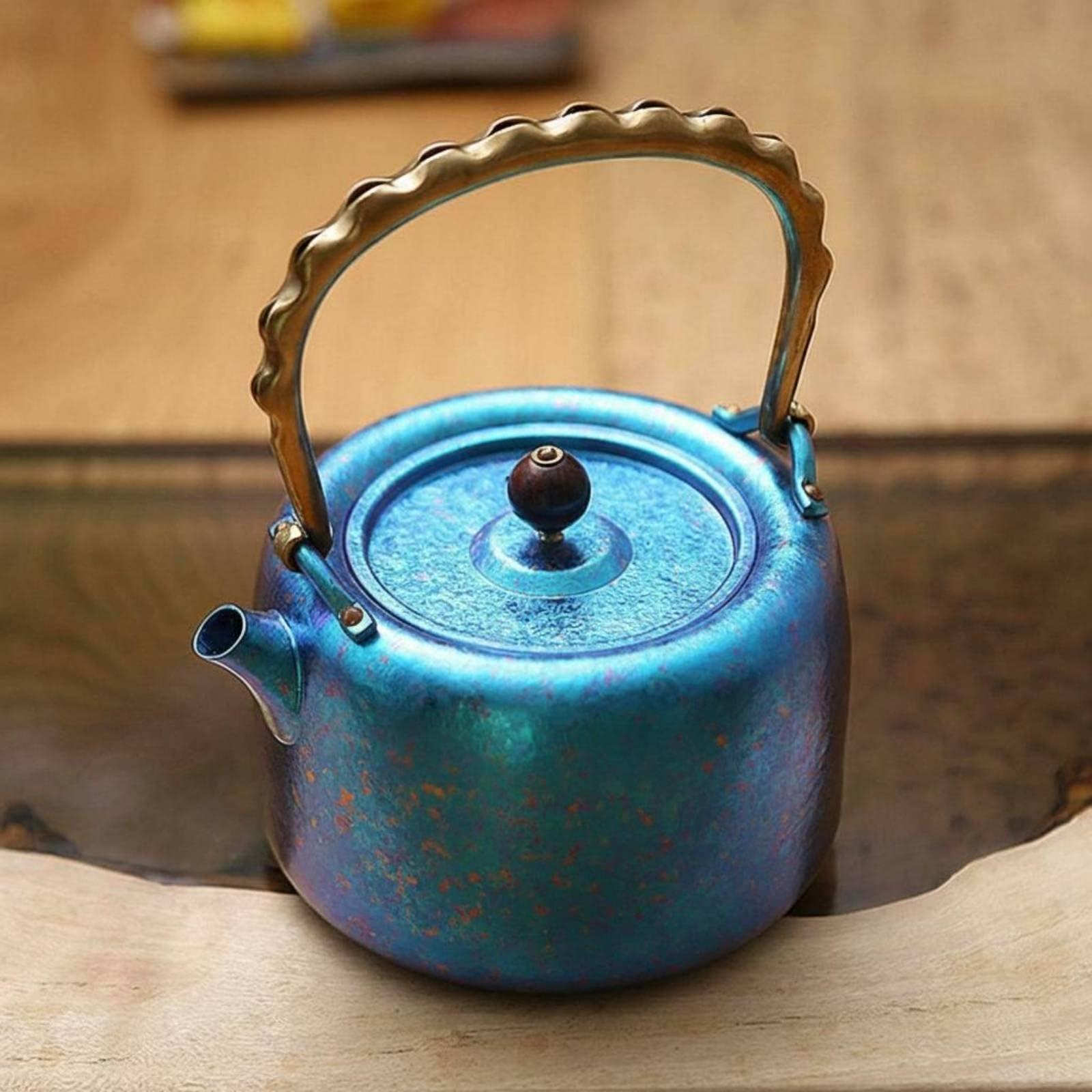 Tetera de Viaje al Aire Libre Tetera Hervidor Jarra Cafetera de Titanio Ligera y Resistente con Vertido Suave y Gran Capacidad Adecuada para Camping, Array, Azul Jingtailan