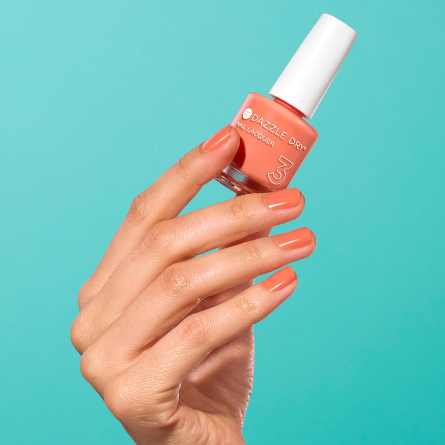 Dazzle Dry Nail Lacquer (Step 3) - Round Trip - A papaya orange. Semi-sheer cream. (0.5 fl oz)