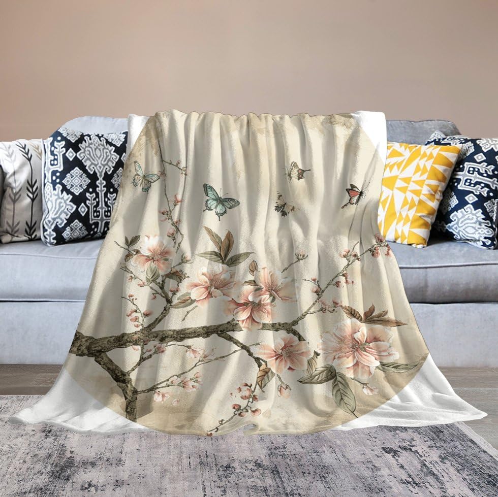 Couverture flanelle fleurs rouges au fini soyeux et confort haut de gamme