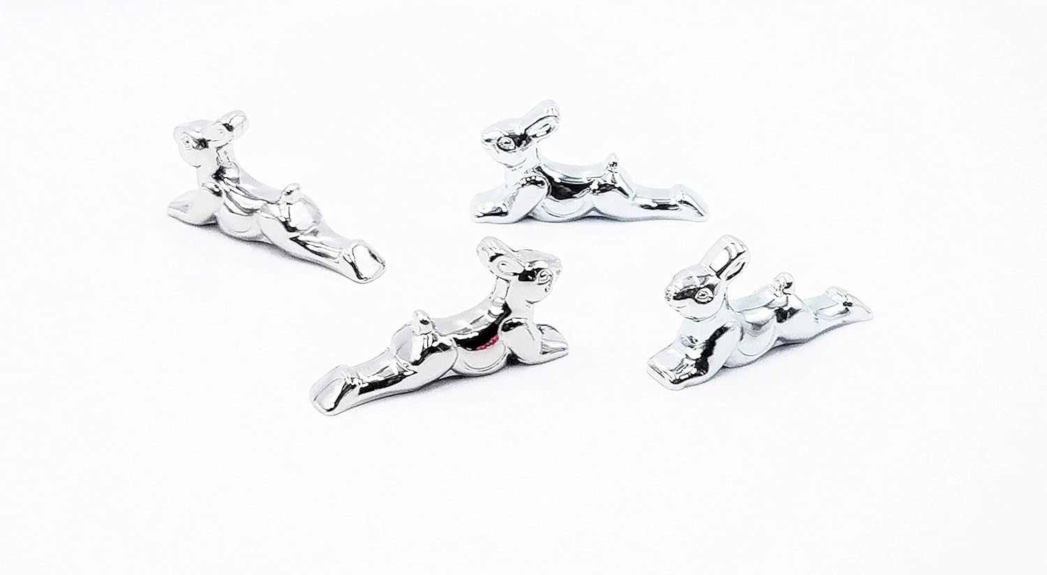 JJ Gifts Stainless steel chopstick and spoon rests shaped like animals of the Chinese Zodiac. Comes as a set of 4 tableware rests. (Dog)