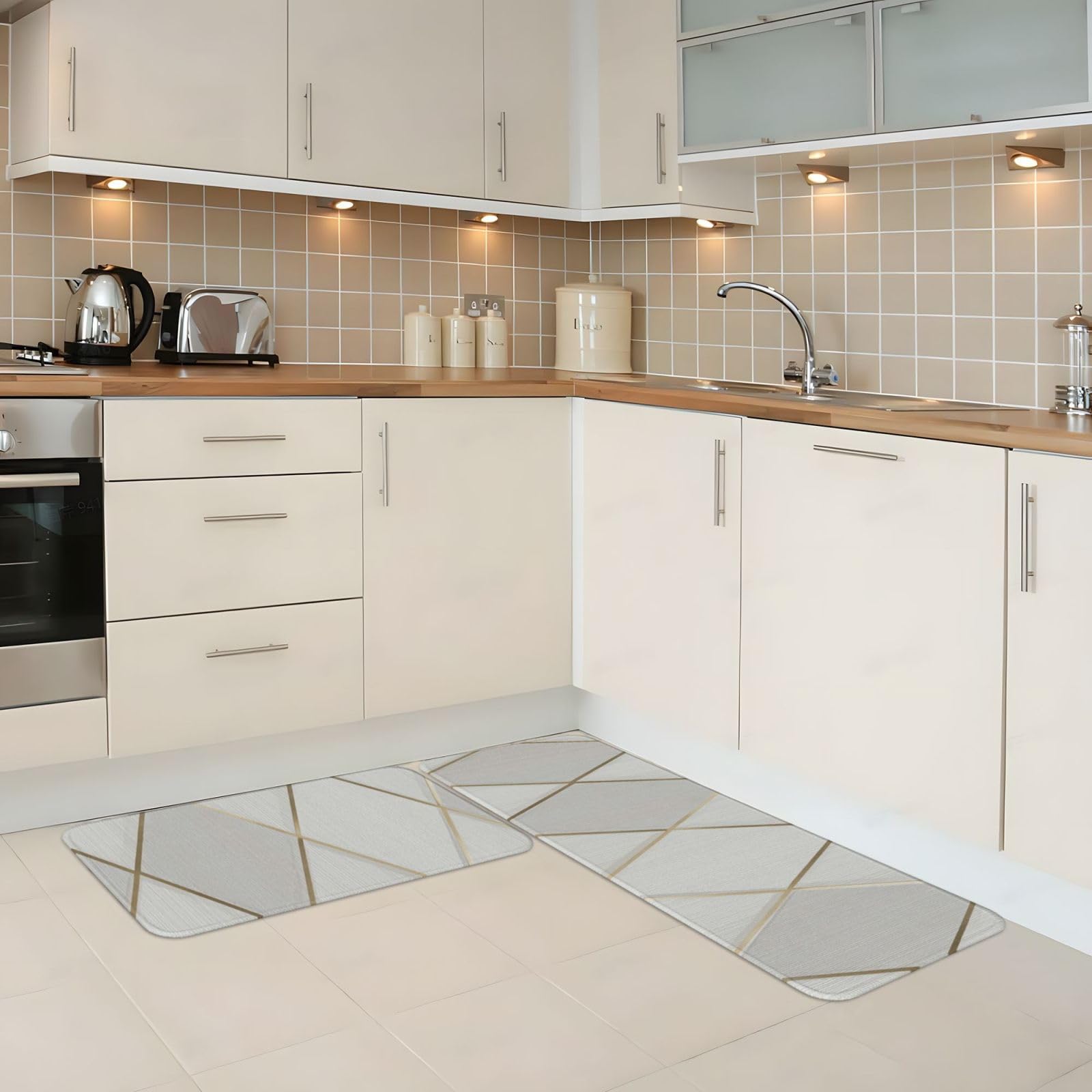 Alfombrillas de cocina acolchadas e impermeables con diseño geométrico marfil y dorado