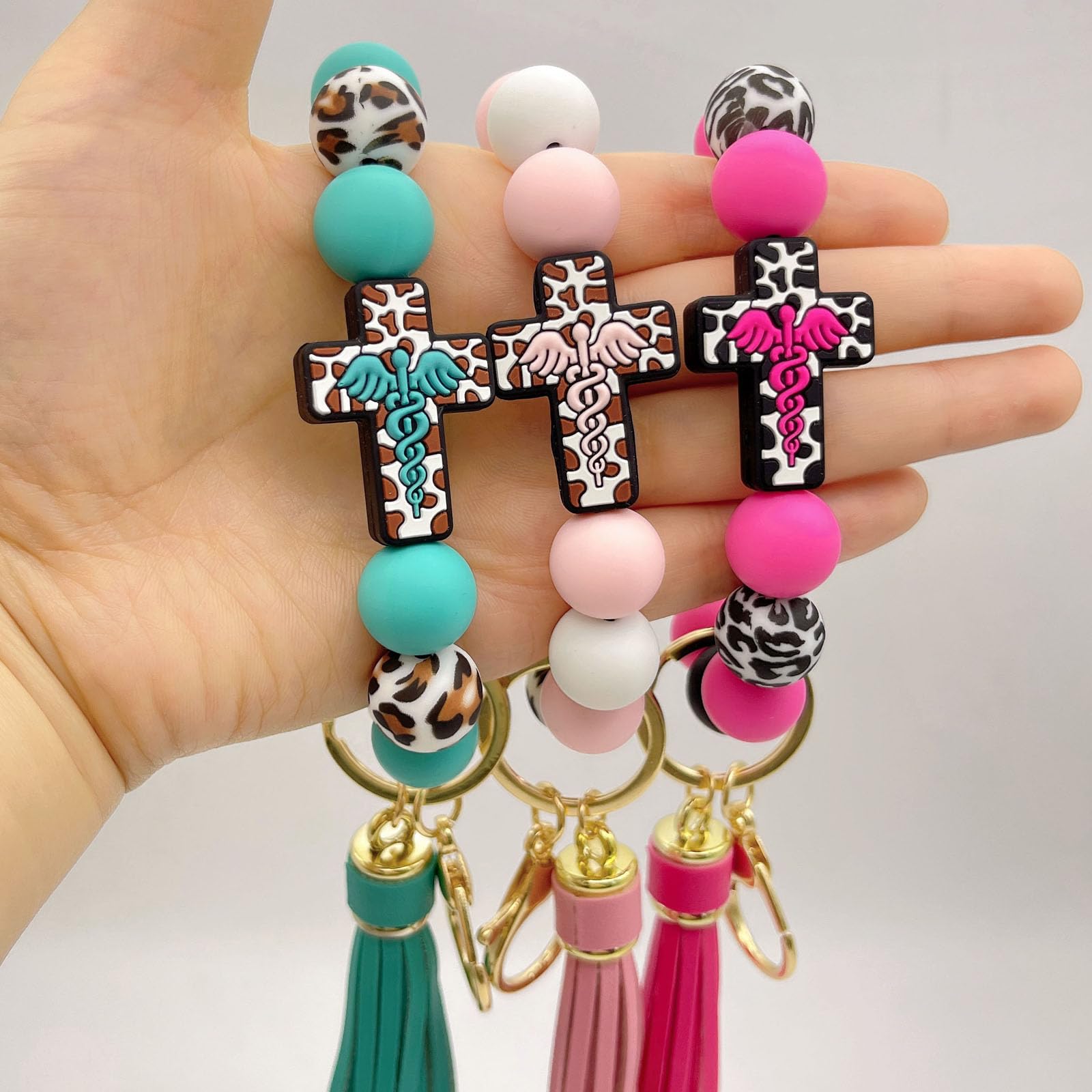 Portachiavi con perline da polso in silicone croce elastico da polso portachiavi nappa braccialetto portachiavi per auto braccialetto portachiavi donna