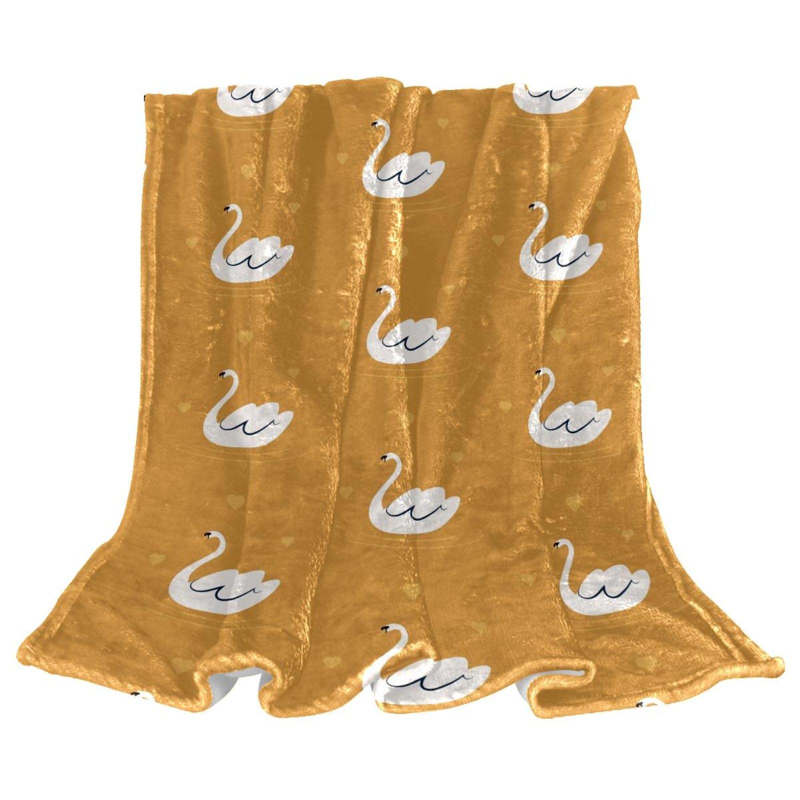 Couverture polaire légère cygne blanc pour vos soirées cocooning sur le canapé