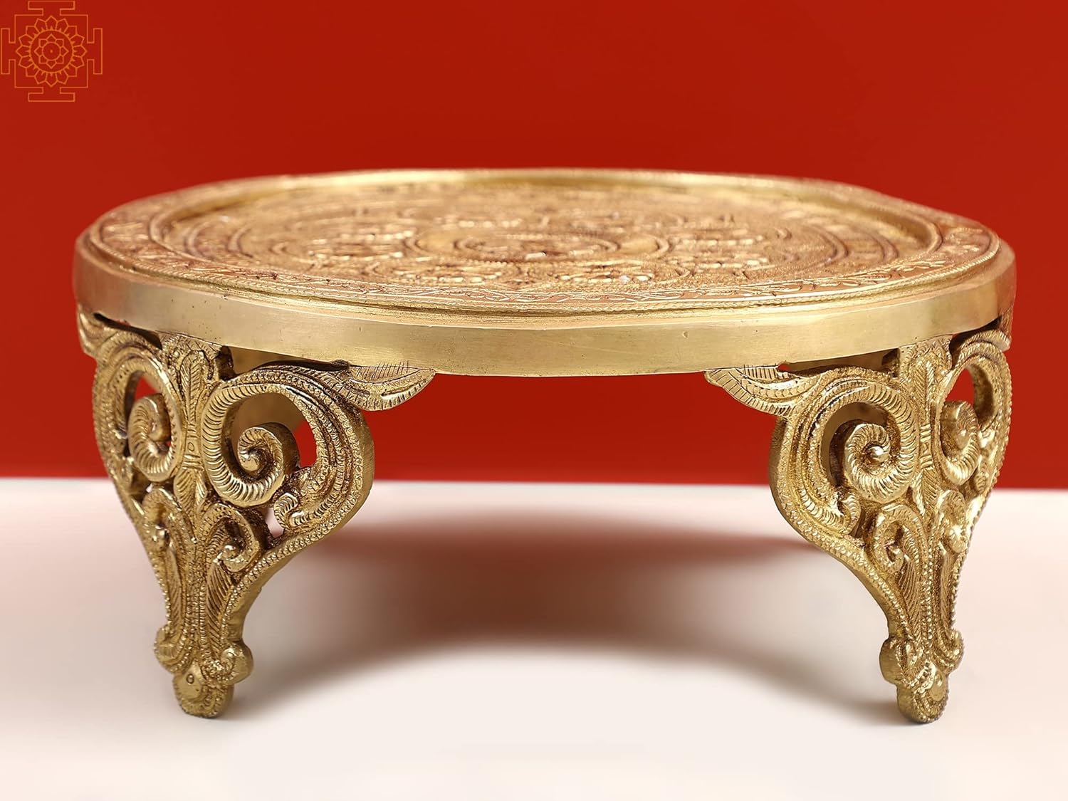 Exotic India 11" Brass Floral Design Pedestal (Chowki) - Brass