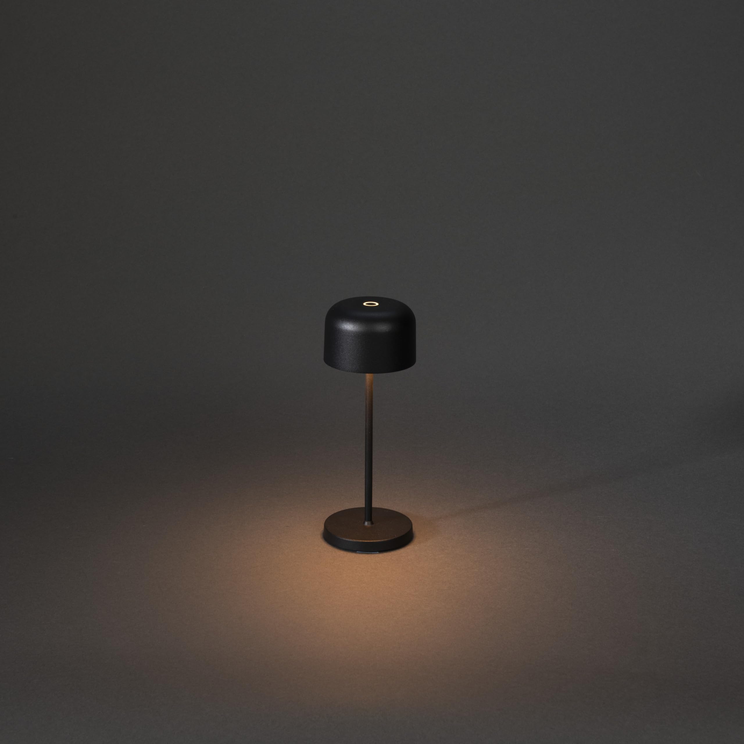 Konstsmide Lámpara de mesa inalámbrica recargable con control táctil y 2 modos de color y base de carga USB incluida, luz alimentada por pilas para uso en interiores o exteriores