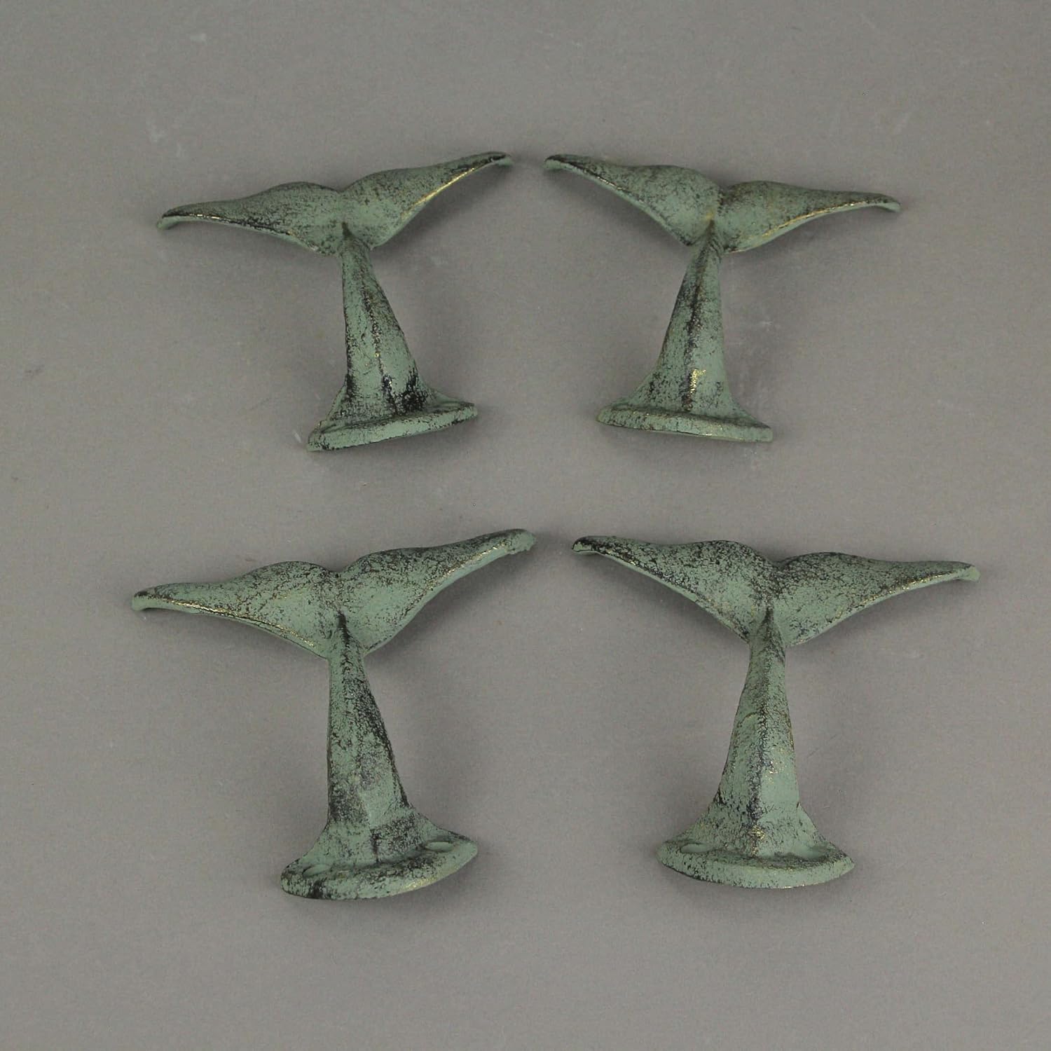 Zeckos Set of 4 Durable Cast Iron Whale Tail Wall Hooks with Verdigris Green Finish - Nautical Decorative Hooks for Coats, Robes, or Leashes - 4.5 Inches Long