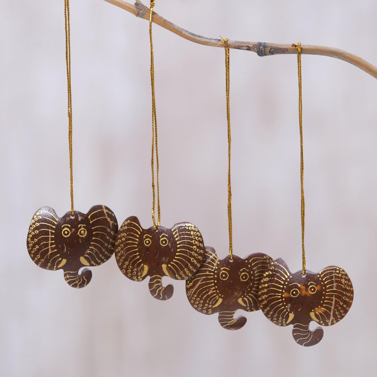 NOVICA Artisan Handmade Coconut Shell Ornaments Set of 4 Elephant Brown Gold Tone Indonesia Holiday Decor Natural Materialsreclaimed Animal Themed Christmas [ 1.9in H x 2in W x 0.2in D] ' Elephant