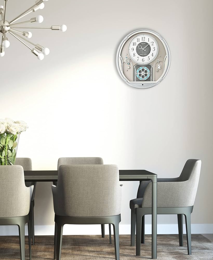 Amazon.com: Seiko QXM375SRH 18 Melodies In Motion Rotating